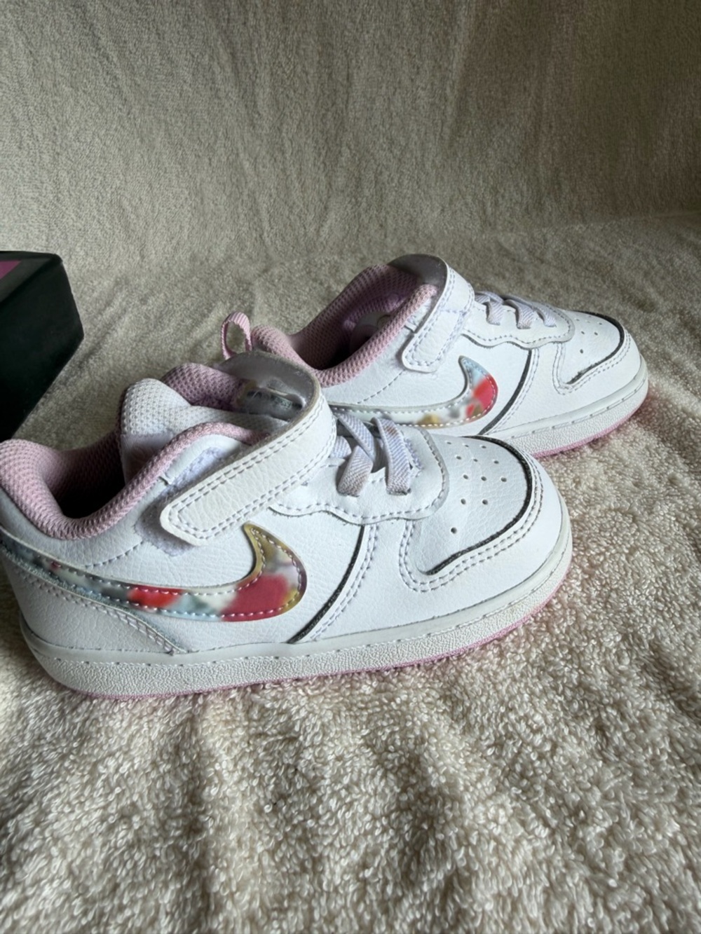 Nike Kids White Sneakers with Pink Lining and Iridescent Swoosh